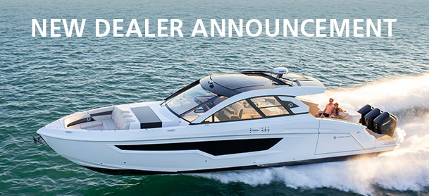 "New Dealer Announcement" with Cruisers Yachts boat running on the water